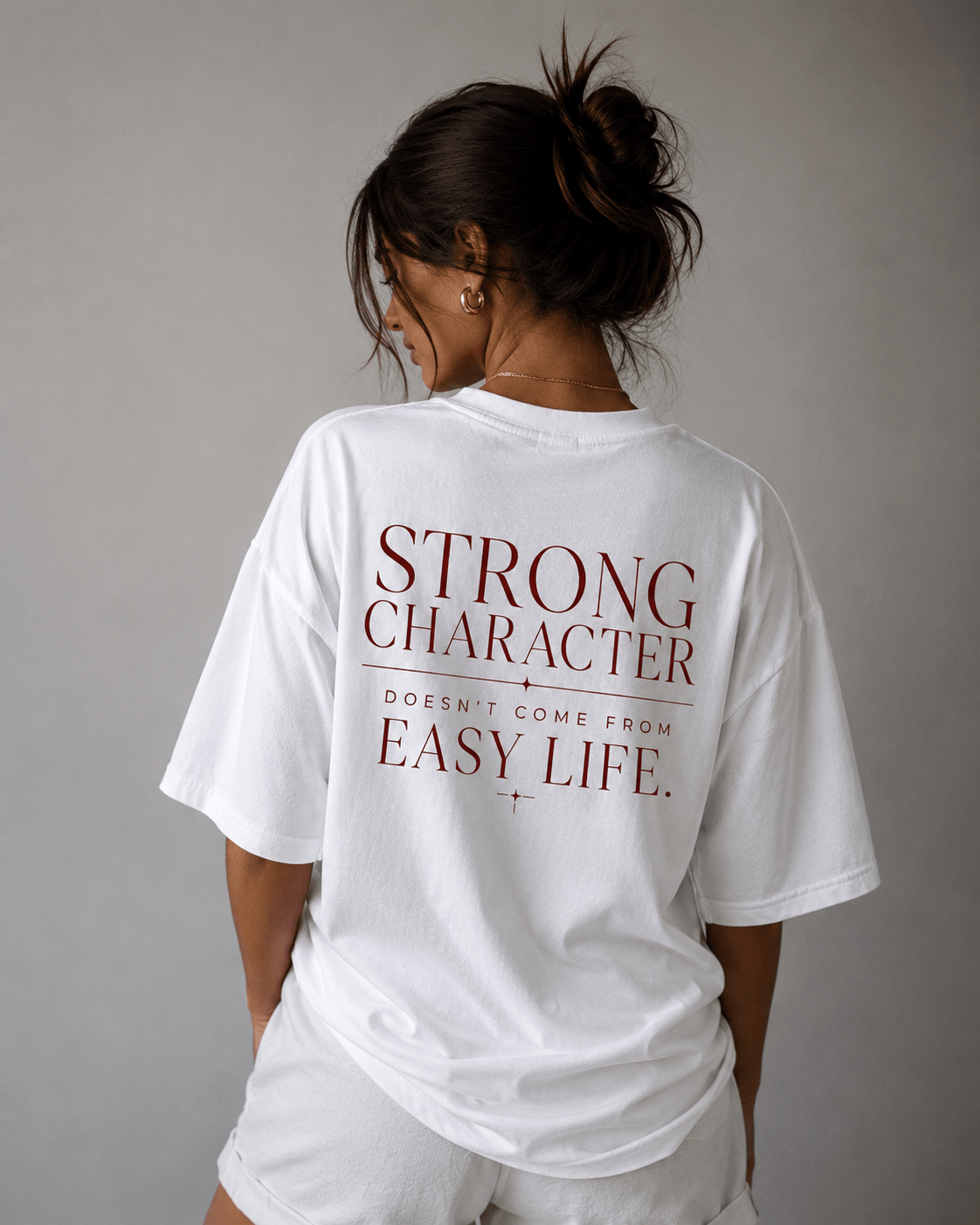 Strong character doesn't come from easy life | Oversized Bio Baumwolle | Statement Shirt