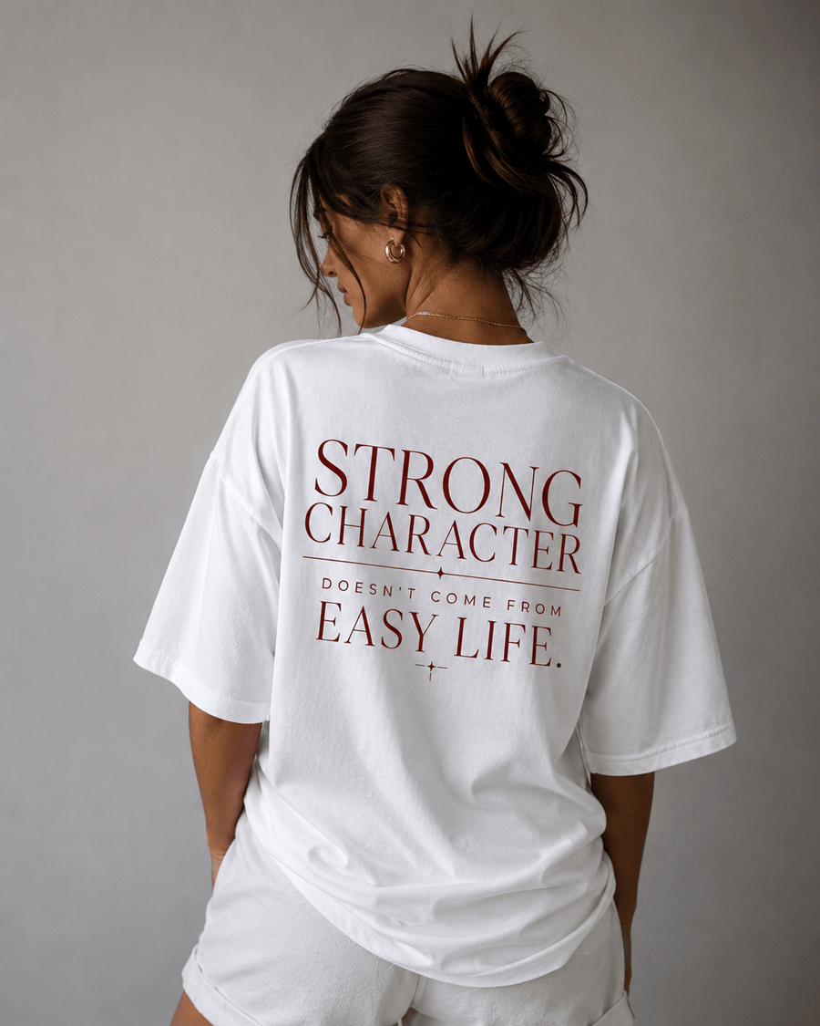 Strong character doesn't come from easy life | Oversized Bio Baumwolle | Statement Shirt